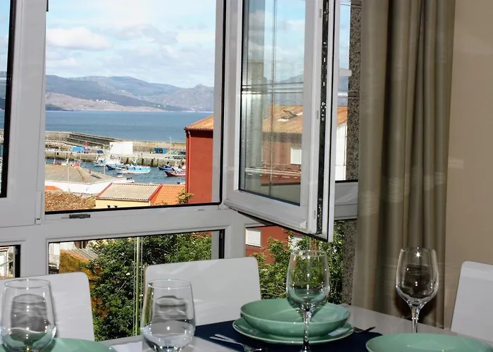 En Centro De * فينيستيري