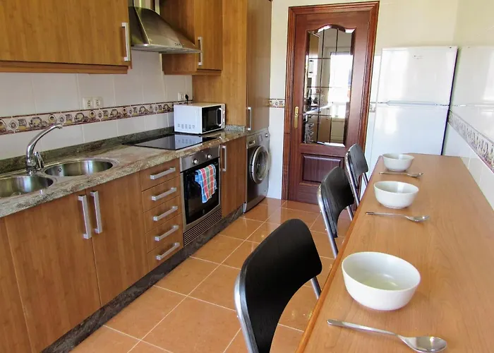 En Centro De * فينيستيري